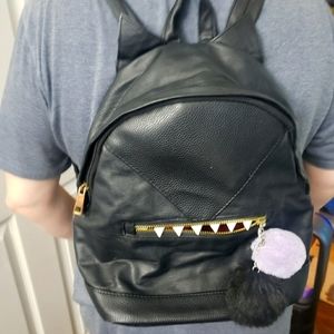 2/20 Leather like backpack.